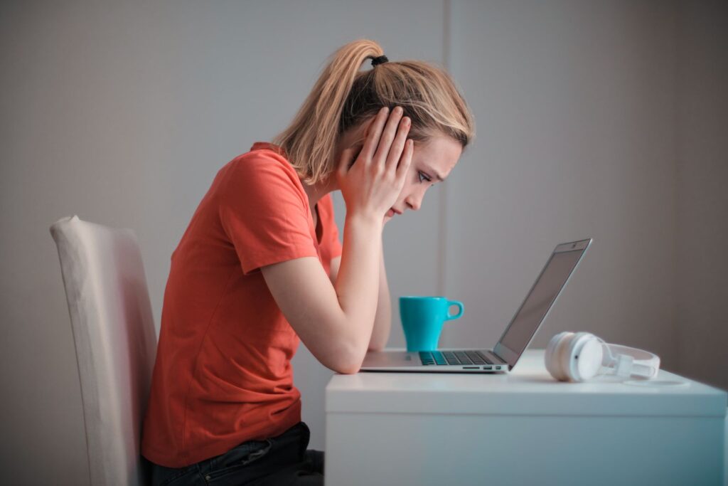 Malta rental scams - apartment hunter searching listings online