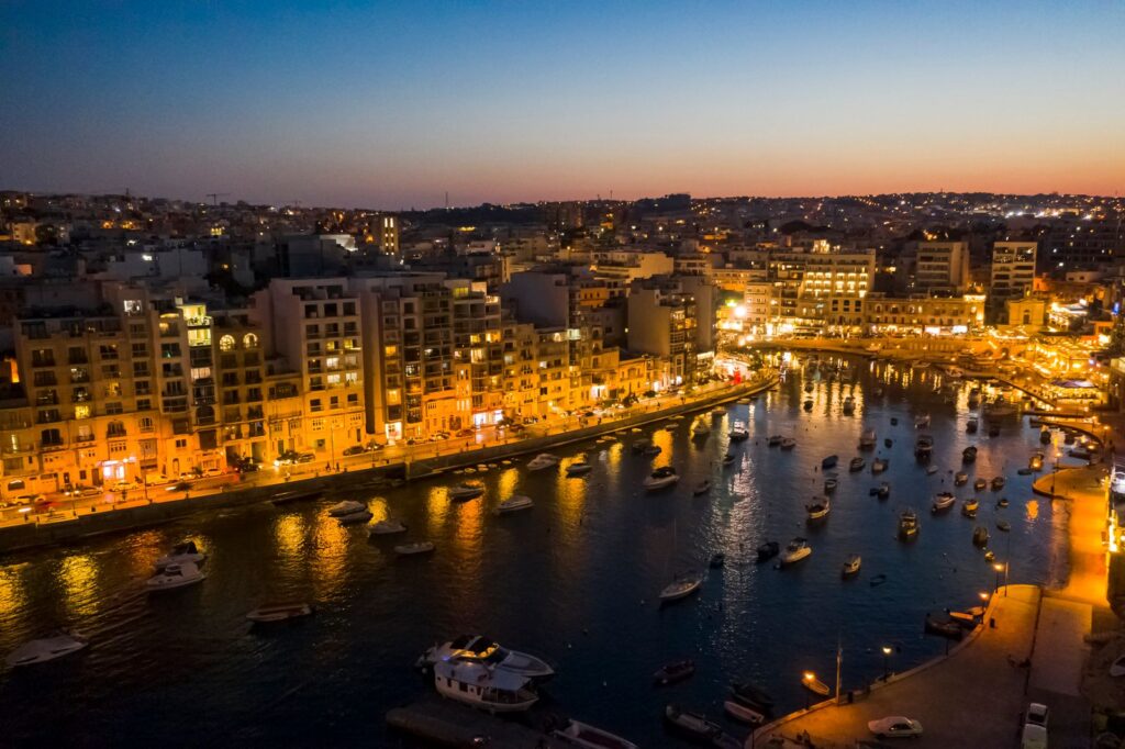 Sliema waterfront illuminated at dusk, Malta