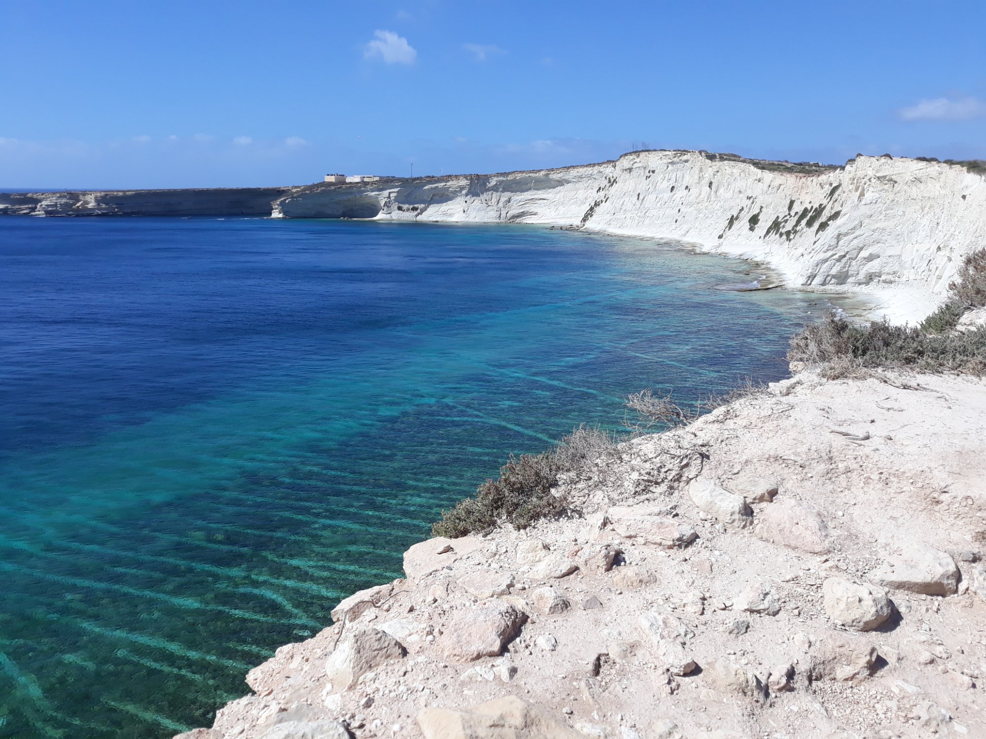 White cliffs and clear water at St Thomas Bay, Marsaskala
