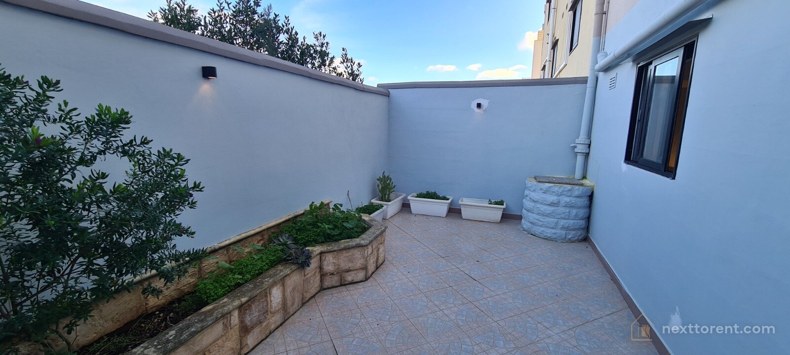 Mensija St. Julians – Stylish Studio with Private Garden – property photo